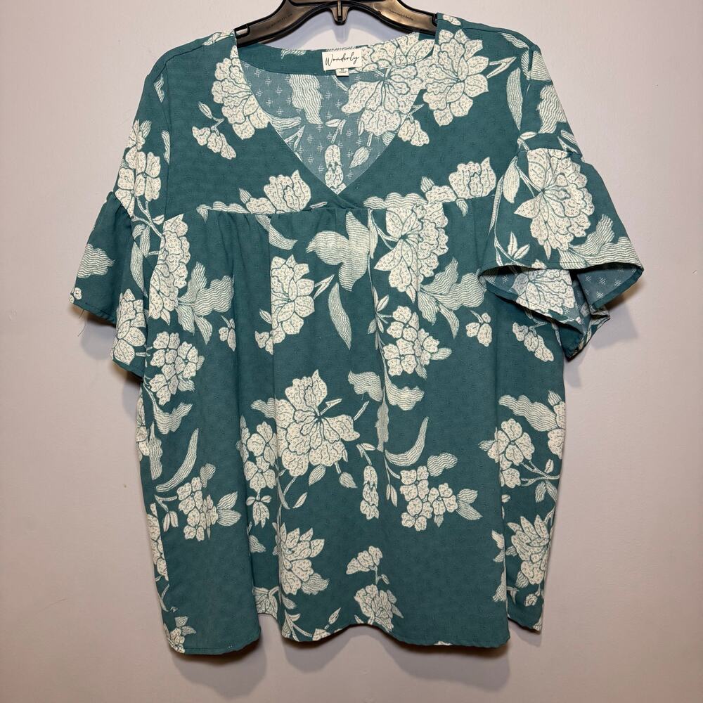 Wonderly V-neck blouse with a green and white floral print & flutter sleeves. 1X